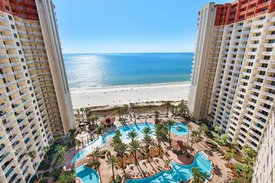 an aerial view of a resort with a pool and the beach at Shores of Panama 1617 in Panama City Beach