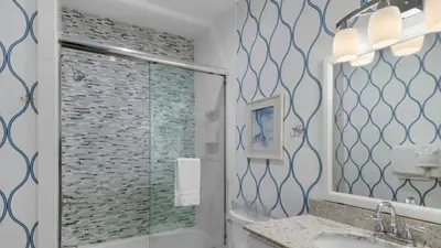 a bathroom with a shower and a sink at Palms C14 in Santa Rosa Beach