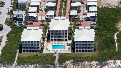 an overhead view of a building with a pool at Villas At Sunset Beach A302 - Sunset Villa in Rosemary Beach