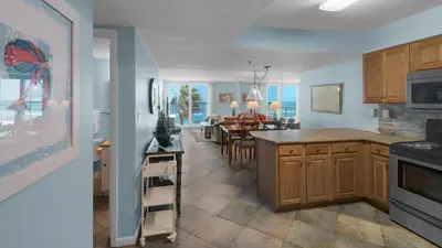 a kitchen and living room with a dining room at Beachcrest 403 in Santa Rosa Beach