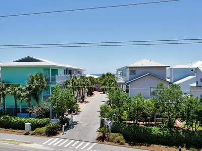 an empty street in front of some houses at Grand Isle 304 in Santa Rosa Beach