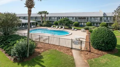 an aerial view of a resort with a swimming pool at Hidden Beach 228 in Santa Rosa Beach