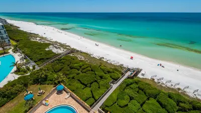 an aerial view of a beach and the ocean at Beachcrest 903 in Santa Rosa Beach