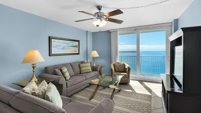 a living room with a couch and a ceiling fan at Beachcrest 904 in Santa Rosa Beach