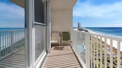 a balcony with a view of the beach at Beachcrest 904 in Santa Rosa Beach