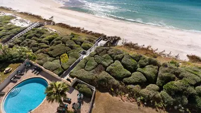 an aerial view of a beach with a swimming pool at Beachcrest 904 in Santa Rosa Beach