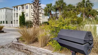 a black mailbox in front of a building at Leeward I Unit 8 in Santa Rosa Beach