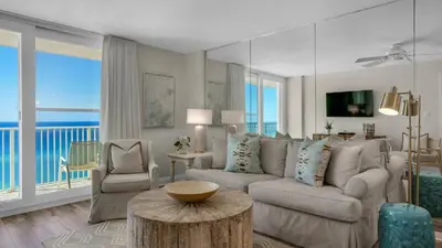 a living room with a couch and a table at Beachcrest 1005 in Santa Rosa Beach