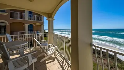 a balcony of a house with a view of the ocean at Monterey Condos C301 in Seacrest