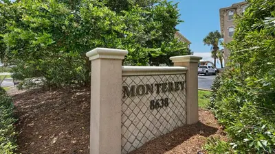 a stone fence with a sign that says morongo at Monterey Condos C301 in Seacrest