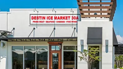 a building with a sign that reads design ice market at Mistral 6 in Seacrest
