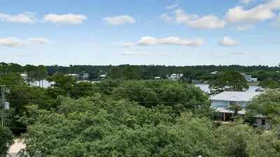 a view of a town with trees and a house at Blue Bungalow in Santa Rosa Beach