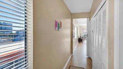 a hallway with a view of a building at Palms D7 in Santa Rosa Beach