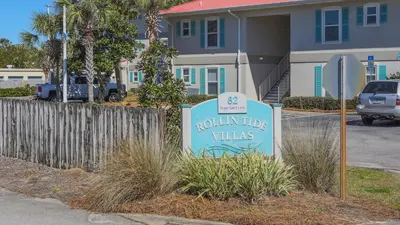 a sign for a north tide villas in front of a house at Rollin Tide C8 in Santa Rosa Beach