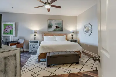 a bedroom with a bed and a ceiling fan at Village of South Walton 314D - Serenity in Rosemary Beach