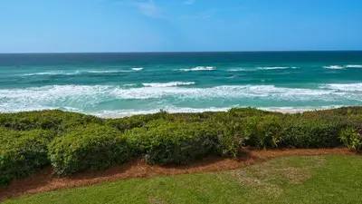 a view of the ocean from a bluff at Tranquillity 220 in Panama City Beach