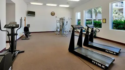 a gym with treadmills and ellipticals in a room at Dunes Of Seagrove 201B in Santa Rosa Beach