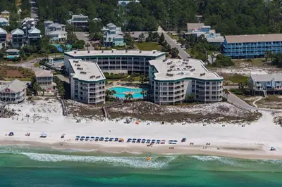 an aerial view of a beach and buildings at Dunes Of Seagrove 201B in Santa Rosa Beach