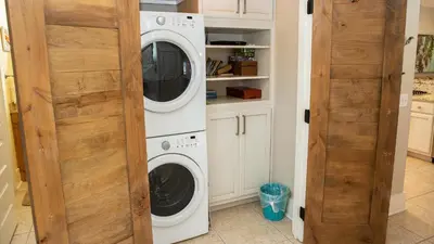 a laundry room with a washer and dryer at Dolphin House in Santa Rosa Beach