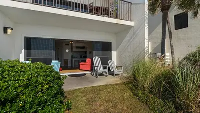 a house with two chairs and a balcony at Emerald Hill 9 in Santa Rosa Beach