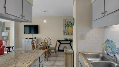 a kitchen with a sink and a counter top at Emerald Hill 9 in Santa Rosa Beach