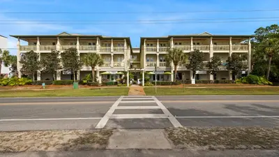 an empty street in front of a large building at Grand Isle 202 in Santa Rosa Beach