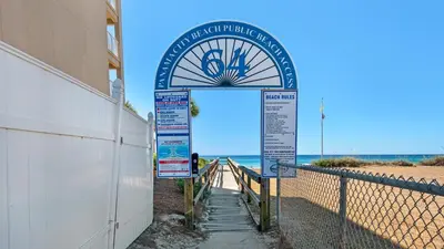 a welcome sign to the beach at a beach house at Seabreeze in Panama City Beach