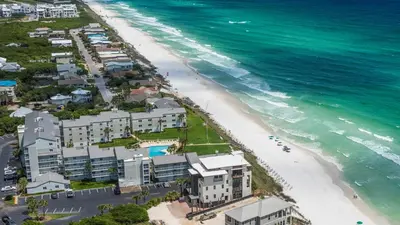 an aerial view of the beach and the ocean at Sand Cliffs 107 in Seacrest