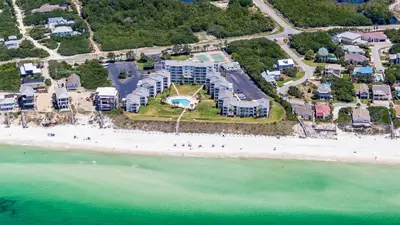 an aerial view of a resort on the beach at Sand Cliffs 117 in Seacrest