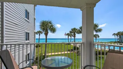 a balcony with a view of the beach at Sand Cliffs 214 in Seacrest