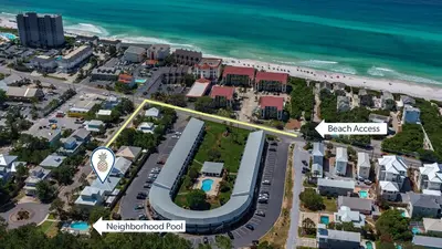an aerial view of a city with the beach at A Slice of Lime in Santa Rosa Beach