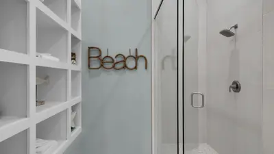 a bathroom with a shower and a glass shower stall at Village of S Walton 311F - Family Tides in Rosemary Beach