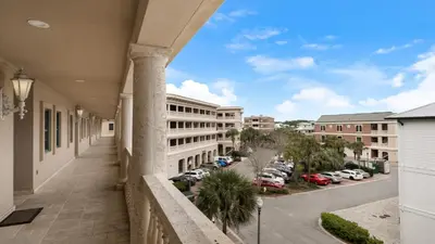 a view from the balcony of a building with a parking lot at Village of S Walton 311F - Family Tides in Rosemary Beach