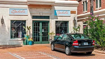 a black car parked in front of a store at Village of S Walton 311F - Family Tides in Rosemary Beach