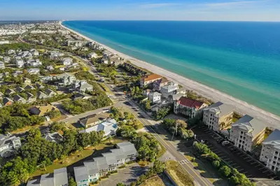 an aerial view of a beach with houses and the ocean at Capistrano E101 in Seacrest