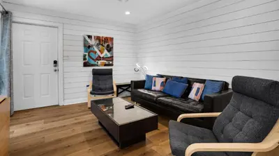 a living room with a couch and a table at Beachside Villas 612 in Santa Rosa Beach
