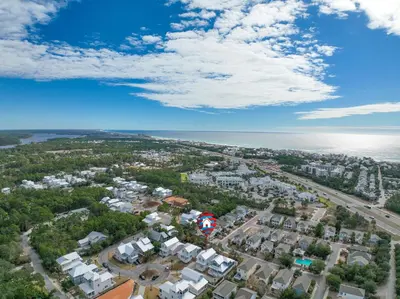 an aerial view of a city and the ocean at 30A Beach House - Mira Bella in Rosemary Beach