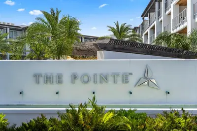 a sign for the pointe hotel on the beach at The Pointe on 30A by Panhandle Getaways in Rosemary Beach
