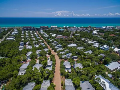 an aerial view of a resort complex next to the ocean at Magnolia Cottages by the Sea by Panhandle Getaways in Seacrest