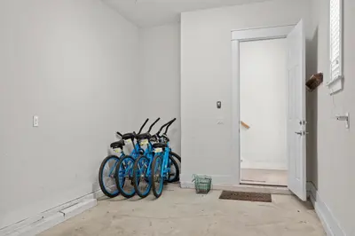 a group of blue bikes parked in a room at Prominence North #89C - Sun Times in Watersound Beach
