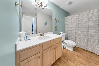 a bathroom with a sink and a toilet at Emerald Isle 1201 in Panama City Beach