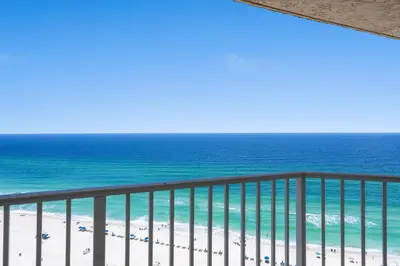 a view of the beach and ocean from a balcony at Enjoy A Birds Eye View at Panama City Beach in Panama City Beach
