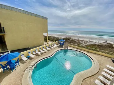 an overhead view of a swimming pool and the beach at Continental 206 in Panama City Beach