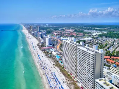 an aerial view of the beach and the ocean at Majestic Beach Towers I #311 in Panama City Beach