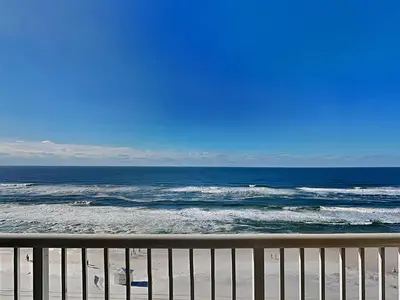 a view of the ocean from the balcony of a beach at Majestic Beach Towers I #913 in Panama City Beach