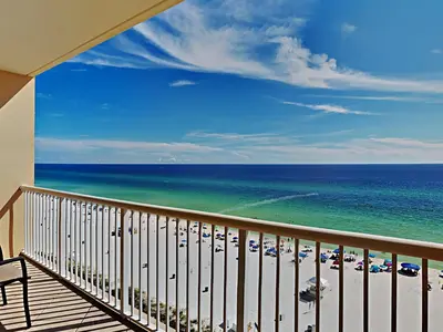 a balcony with a view of the beach and the ocean at Majestic Beach Towers I #914 in Panama City Beach