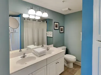 a bathroom with a sink and a toilet at Majestic Beach Towers II #707 in Panama City Beach