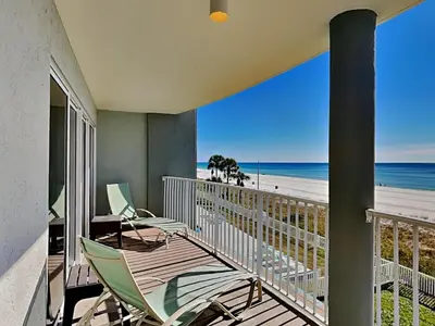 a balcony with chairs and a view of the beach at Long Beach Resort Tower II #202 in Panama City Beach