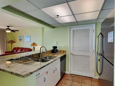 a kitchen with a sink and a counter top at Long Beach Resort Tower II #202 in Panama City Beach