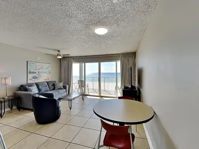a living room with a couch and a table at Long Beach Resort Tower II #305 in Panama City Beach